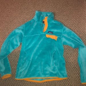 Patagonia women’s teal and mustard pullover